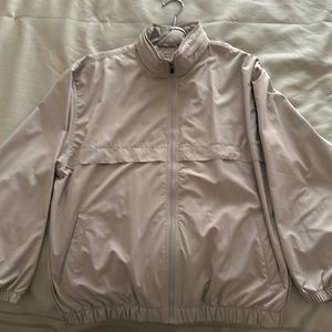 Rarely worn Greg Norman lightweight golf jacket with hood